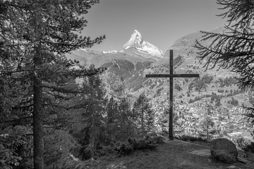The Matterhorn peak with the cross over the Zermatt.