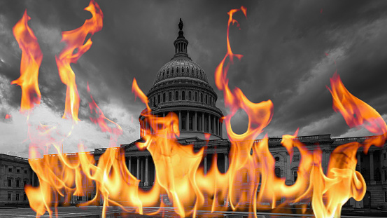 Capitol Building on Fire Representing a Lack of Faith in Elected Officials and Codes of Ethical Conduct.