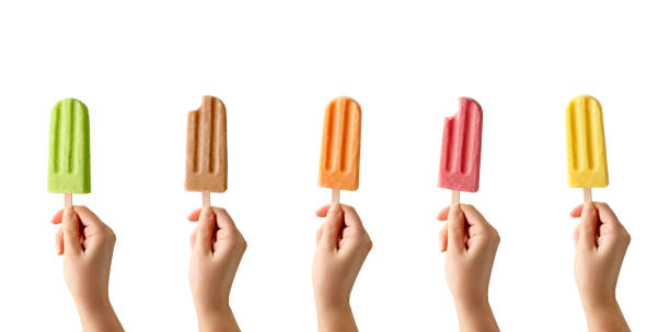 Hands holding different types of colorful fruit popsicles on white background Hands holding different types of colorful fruit popsicles isolated on white background. Strawberry, mango, caramel, apple and orange flavor popsicle stick stock pictures, royalty-free photos & images