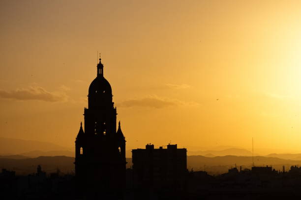 Sunset in Murcia with the cathedral tower in the background