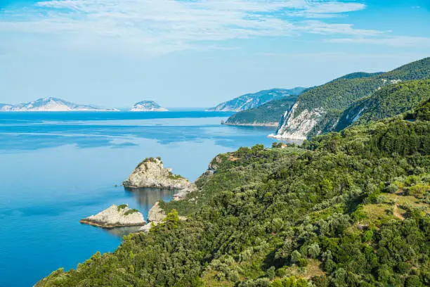 Rock with famous church Agios Ioannis Kastri on Skopelos island, Greece at sunset, where scenes of 'Mamma Mia!' movie were filmed.