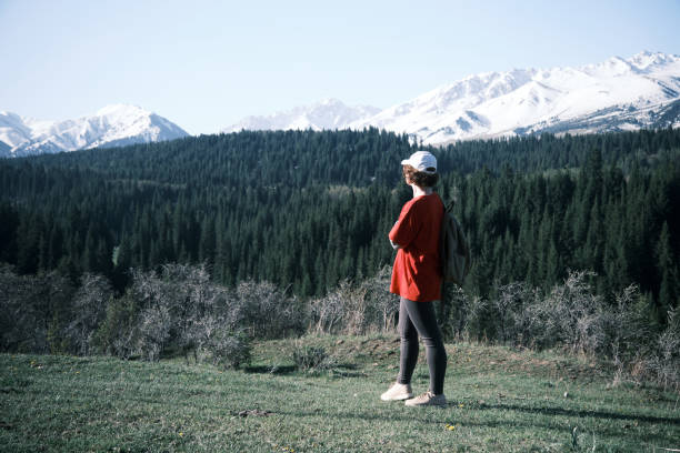istock Female hiker is looking around in mountains 1489165380