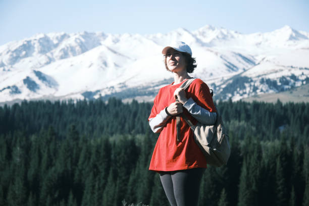 istock Female hiker is looking around in mountains 1489165739