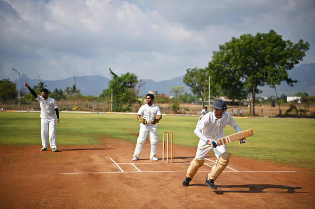 istock Batsman taking run after hitting the ball during cricket match 1489166271