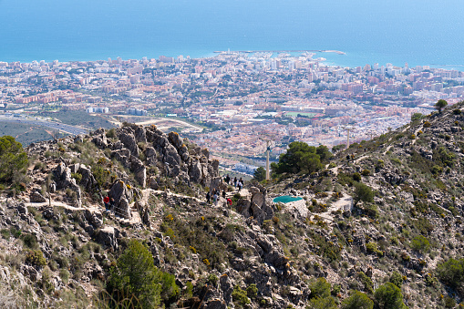 Visitors enjoying the views of the Costa del Sol coast from the cable car tourist attraction at Monte Calamorro Benalmadena, Spain on Wednesday 1st March 2023