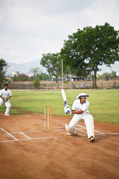 istock Batsman playing a Sweep shot during a cricket match 1489166482