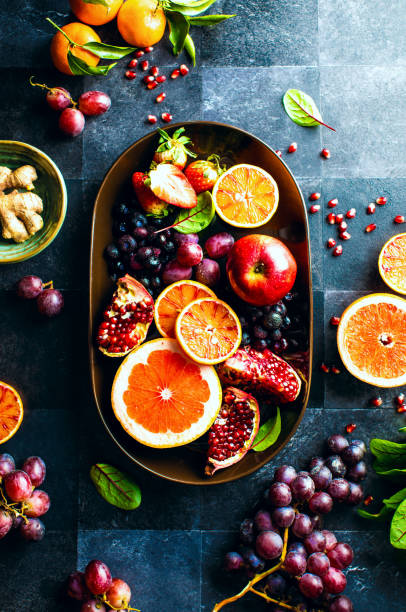 istock Fruits and berrires in a dish, top down view 1489167911