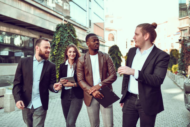 istock Future Multiethnic Business Partners Enjoying Jokes And Fun Outside 1489168992