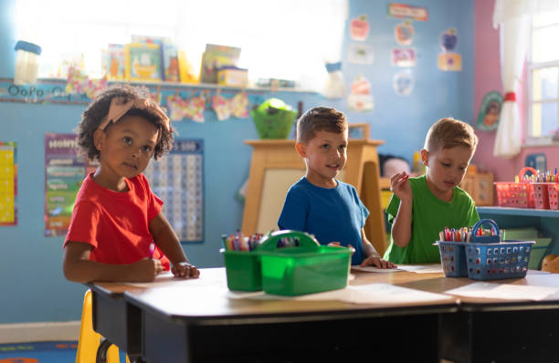 istock Three kids actively learning and growing in a nurturing daycare environment 1489170299