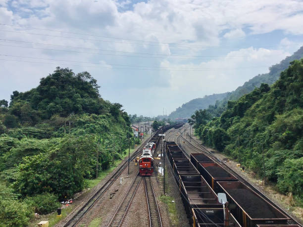 istock coal hauling train with natural scenery in the background 1489170818