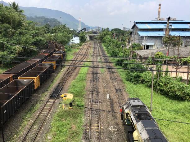 istock coal hauling train with natural scenery in the background 1489170819