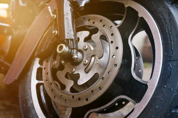 istock Wheel and disc brake system of a motorcycle close-up. 1489181919