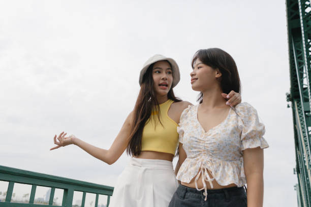 istock Friends Talking Walking Outdoors 1489182428