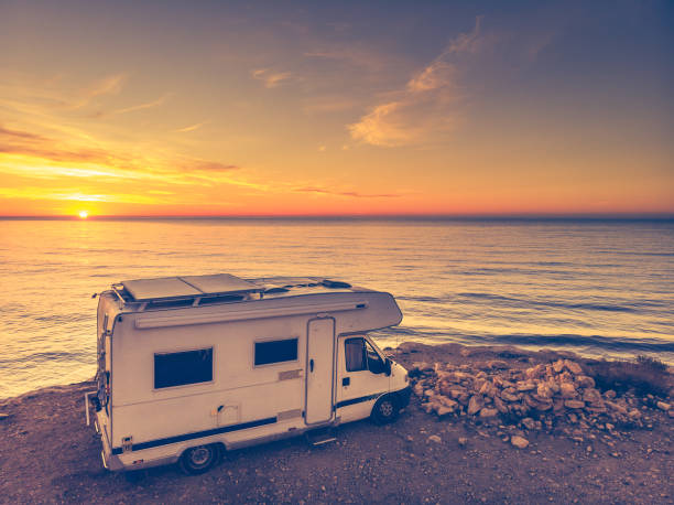 istock Caravan on sea coast at sunrise. Aerial view 1489183720