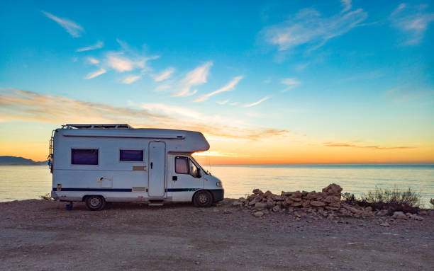 istock Caravan on sea coast at sunrise. Aerial view 1489185770