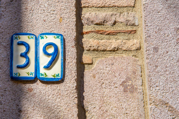 istock The old Number 39 sign is blue and white on the wall. 1489186202