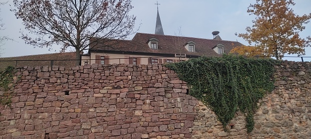 Image of the famous ancient defensive walls of the village of Bergheim