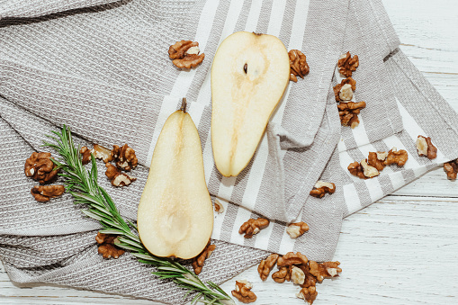 Hommade sun dried pears on wooden background