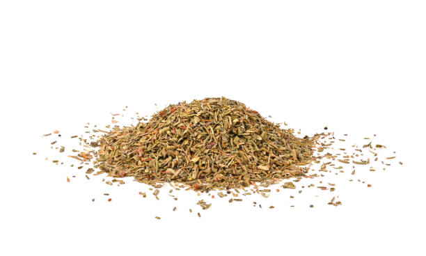 istock pile of dry thyme isolated on white background. 1489191070