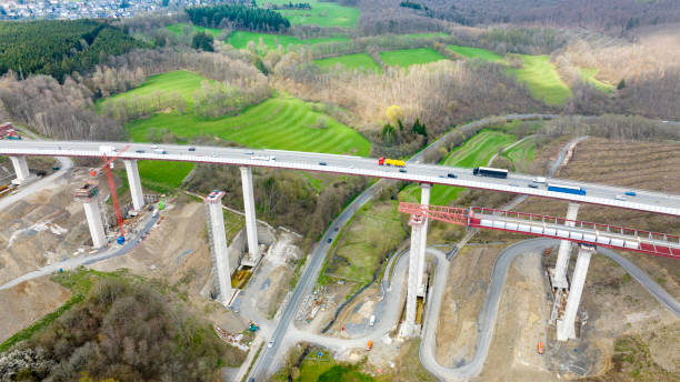 istock Construction site of a highway bridge. Aerial view 1489191428