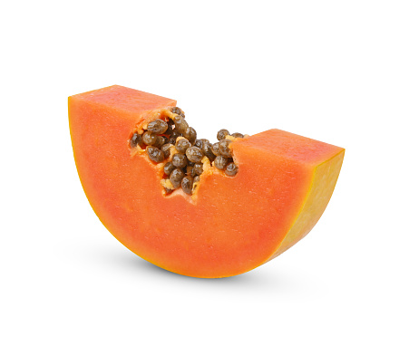 slice ripe papaya fruit with seeds isolated on white background. full depth of field