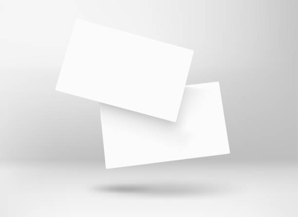 istock Two blank white business cards in perspective. 3d vector mockup for branding 1489194813