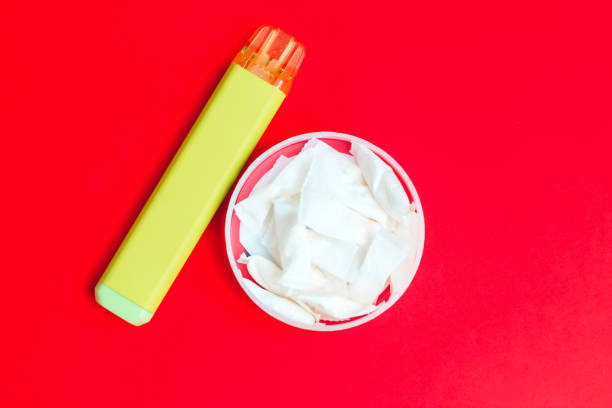 istock Nicotine pads snus, cigarette replacement, together with an electronic cigarette 1489195404