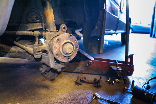 istock Auto repair. Brake change 1489197922