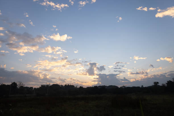 Beautiful sky and cloud at high. Landscape include space, light of nature, sunset, sunrise, horizon or skyline. Colorful with yellow, orange and blue at evening in autumn for background and wallpaper.