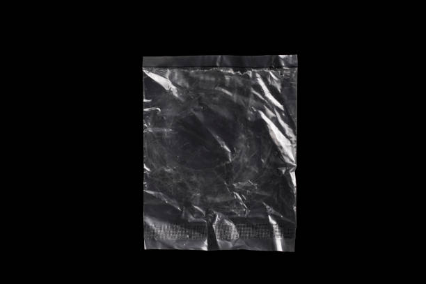 istock Transparent plastic bag isolated on black background. 1489202805