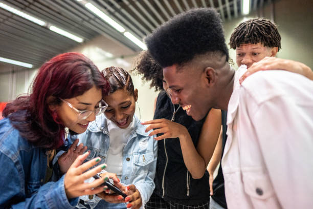istock Friends using the mobile phone at the subway station 1489203720
