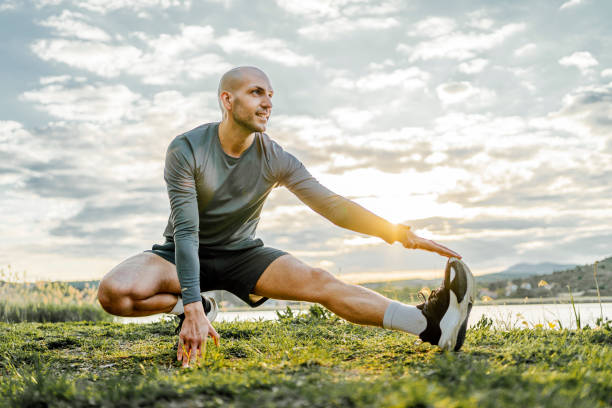 istock Man exercising by the lake 1489205530