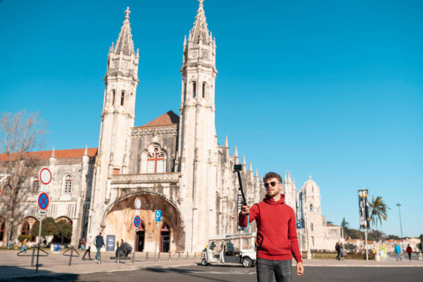 istock Tourist taking a selfie in front of the Jeronimos Monastery 1489206652