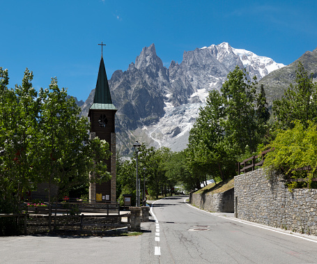 The  Mont Blanc massif and Brenva glacier from St. Margerita church in Entreves - Val Ferret valley in Italy.