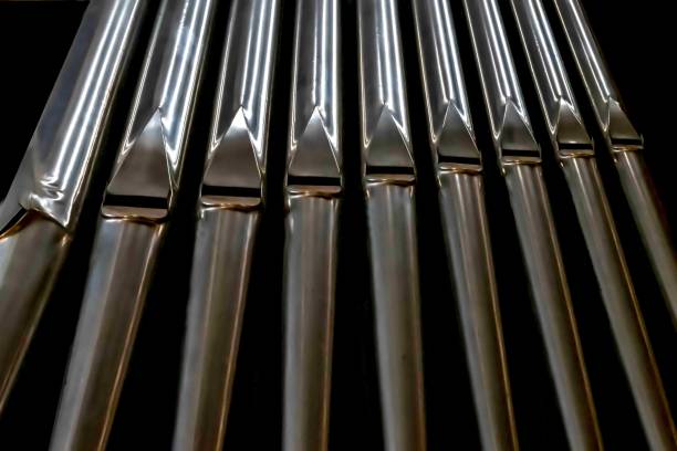 istock several pipe pipes in a row on a black background, 1489209237