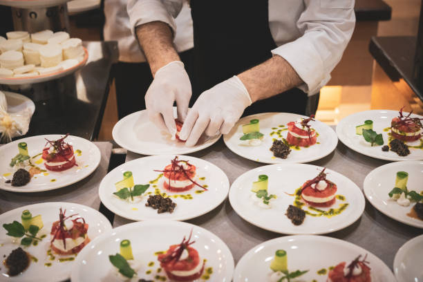 istock Chefs prepares Tomato and mozzarella salad at the hotel buffet 1489215042