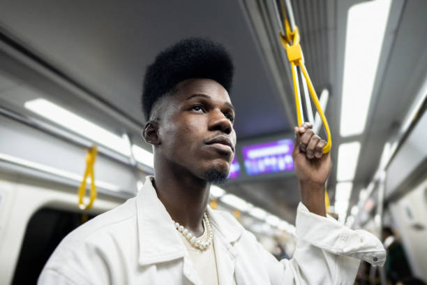 istock Young man on the subway train 1489218692