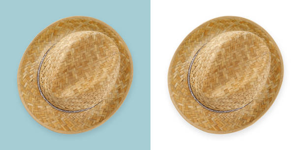 istock Gardening wicker straw hat, top view isolated on white and light blue background, spring concept for home gardening or vegetable garden and plant care. 1489218837