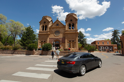 A street view of the The Cathedral Basilica of St. Francis of Assisi in downtown Santa Fe, New Mexico on May 5 2023.