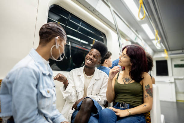 istock Friends talking on the subway train 1489218927