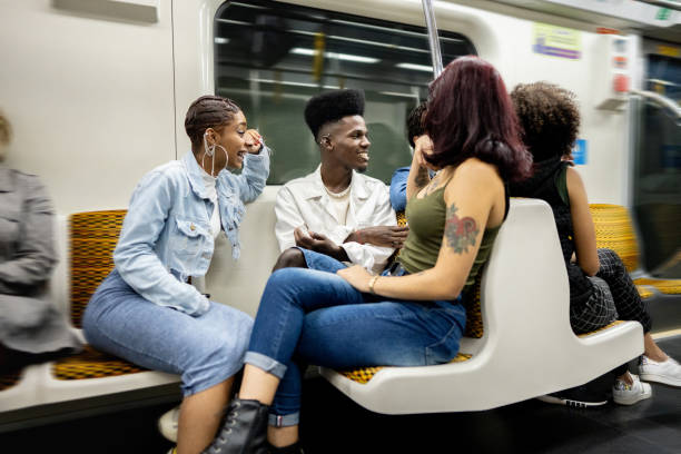 istock Friends talking on the subway train 1489218946