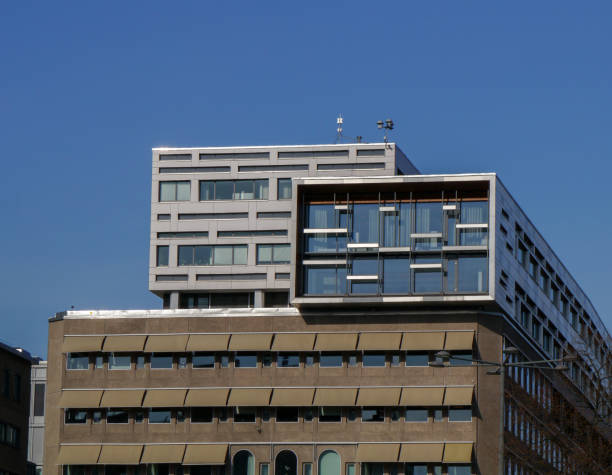 istock Low angle view of modern building against sky 1489227596