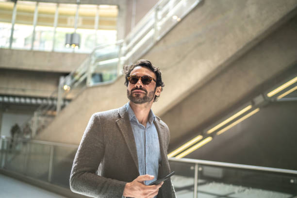 Mature man walking at a subway station
