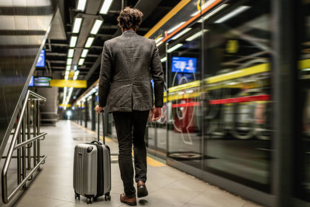 istock Mature man walking at a subway station 1489235147