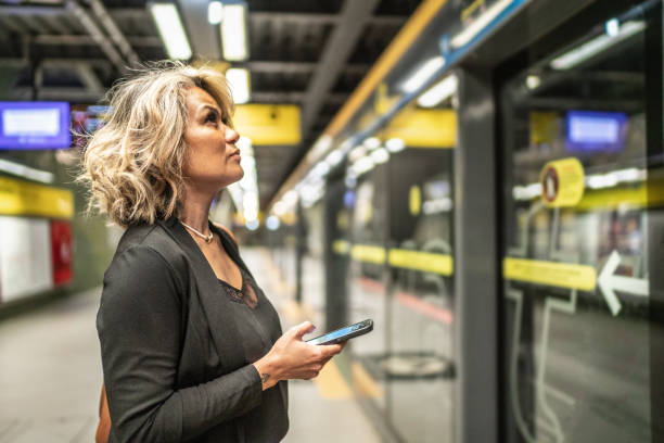istock Mature woman at a subway station 1489235324