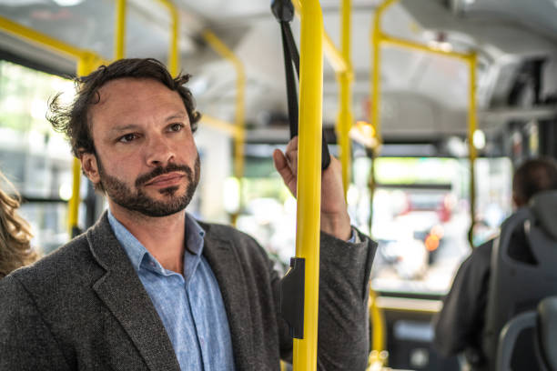 istock Mature businessman in the bus 1489235876