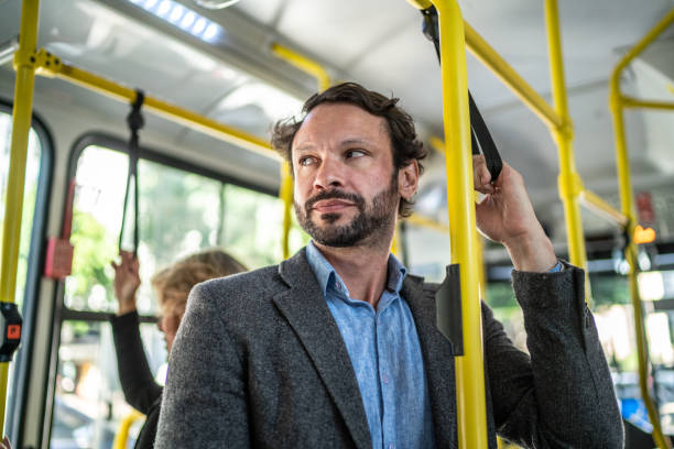 istock Mature businessman in the bus 1489235898