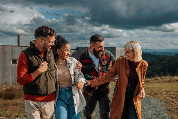 istock Cheerful friends out for a walk in nature. 1489239283