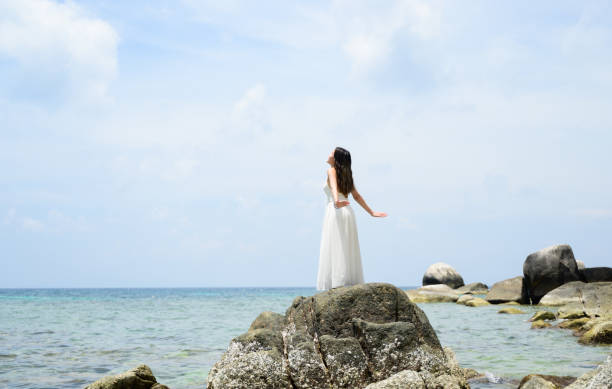 Free Stock Photo of Woman Standing in Water Wearing White Dress ...
