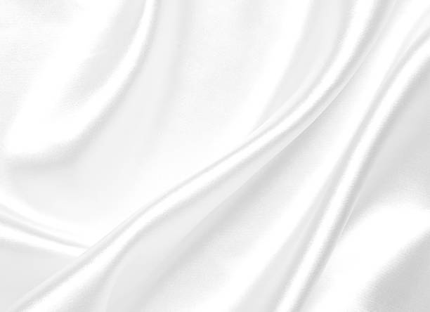 istock The luxury of white silk or satin fabric texture for background 1489244066